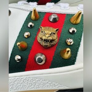 White Sneakers with Gold and Red-Green Stripe